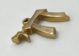 LOT 41: Goldtone Jarconi Chai Symbol Pendant, Sterling ...