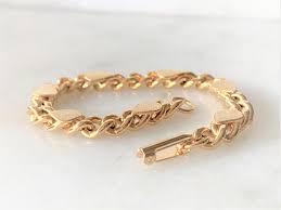 Curb Chain Motifs Link Bracelet With Fold Over Clasp in Gold ...