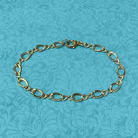 Yellow Gold Infinity Link Bracelet – Continental Jewelers, Inc.