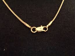 Heart Gold-Toned Pendant Filled with Rhinestones and an 18 ...