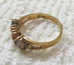 Lot - 10Kt Yellow Gold 4 Stone Mothers Ring Sz 7.5