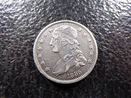 Sold at Auction: **AU** 1835 Small Sized Capped Bust Quarter