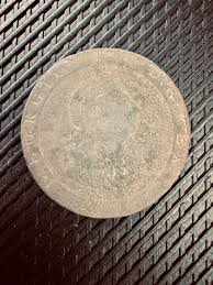 First ever time swinging a detector outside the back garden. 3rd hole (after digging up 2 old nails) and I found this. Dated 1797, George III "Cartwheel" Penny. Can't believe it, well