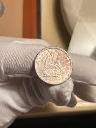 1853 seated liberty quarter w/rays that has some very nice ...