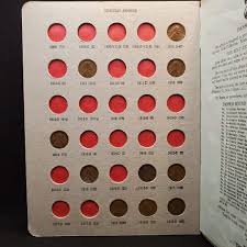 Lot 56 - DANSCO Lincoln Penny Album 1909-1929 containing 28 early Wheat Cents - Puget Sound Seller Managed Estate Sale Auction