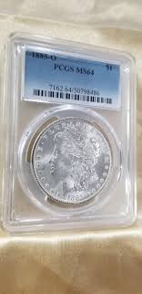 STUNNING 1885-O MORGAN SILVER DOLLAR. MS64