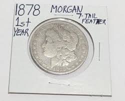 1878 Morgan Silver Dollar Seven Tail Feather First Year Auction | 1BID