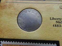 Sold at Auction: Early Classic Old West Coin & Stamp Collection w/ History - 2 Coins & 2 Stamps