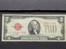 Sold at Auction: (2) 1928 G $2 Red Seal U.S. Notes