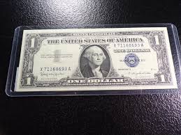 At Auction: Lot of Ten Various 1935 & 1957 Series $1.00 Silver Certificates