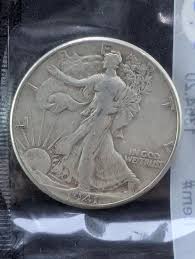 Sold at Auction: 1941 Walking Liberty Half Dollar in ...