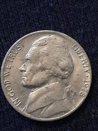 Hi I carnt find mint mark on this coin and the word liberty ...