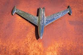 Chrome Jet Airplane Hood Ornament on A Rusty Classic 1956 ...