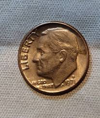 Is the IN God We Trust on a 1971 mint mark D Dime an error?