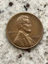 1965 Lincoln Penny No Mint Mark. RARE Error L & WE TRUST on rim