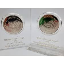 Lot - 2 United Nations Sterling Silver Proof Peace Medal