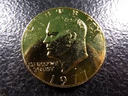Sold at Auction: Gold *LAYERED* 1977-D Eisenhower Dollar