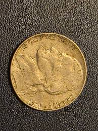 Is this large nickel authentic and worth getting certified?