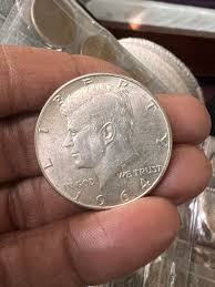 Is a 1964 silver Kennedy half dollar coin worth anything?