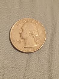 What are the errors on a 1987 quarter with missing word 'in ...