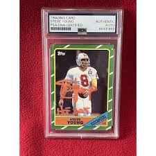 Steve Young 1986 Topps Signed Football Rookie Card #374 Auto Graded PSA 10 Cert # 1162307010