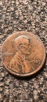 Been going though some older wheat pennies and came across this one. '1958 D' are both raised above the damage which tends to make me believe that this was done during the