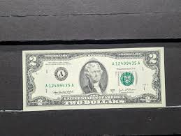 Sold at Auction: 2003-A Green Seal $2 Note. GEM CRISP UNC