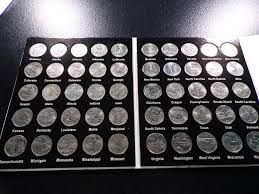 Sold at Auction: Complete Fifty States Quarter Collection in Album