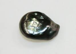 Black Tahitian Keshi Pearl - 0.56 gm.