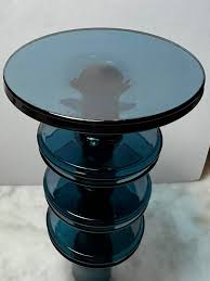 Looking very much like a Wedgwood glass Sherringham candlestick, but with the exception of a much smaller & narrower top. I haven't found another, does this particular model have its own name