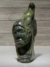 Sold at Auction: Kaka Ashoona, Kaka Ashoona (Kinngait [Cape Dorset], 1928-1996) stone sculpture, woman and seal