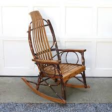 Sold at Auction: ROMAN M. TROYER ADIRONDACK ROCKER