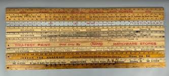 Sold at Auction: Group of Advertising Yardsticks