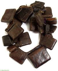 ethiopia ~ kitabe amulets, leather, ca 1850, magical scrolls within these leather cases relating to the ethiopian orthodox church ~