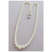 Beautiful Strand of Light Cream Cultured Pearls with 10 K ...