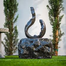 XBrand 24.6-in H Brick Electric Powered Outdoor Fountain Statue Pump Included in the Outdoor Fountains department at Lowes.com