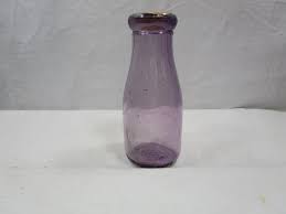 Sold at Auction: Vintage Bestov Sun One Pint Sun Purpled Milk Bottle