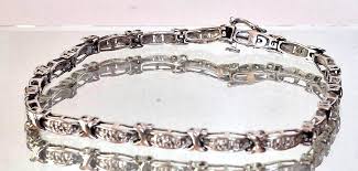 WHITE GOLD AND DIAMOND "HUGS AND KISSES" TENNIS BRACELET | eBay