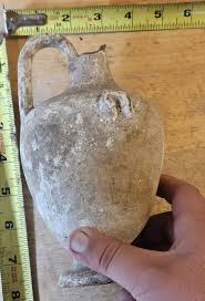 Can anyone help me with the age and orgin of this artifact ...