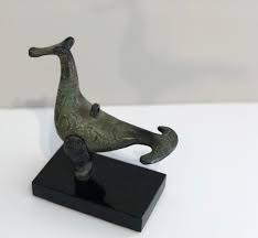 bronze bird on base | It's All Greek