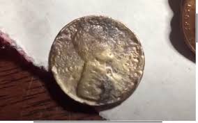 Does this penny look burned or been underwater? : r/coins