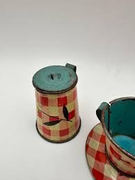 1930's Ohio Art Fern Bisel Peat Child's Tin Tea Set | EstateSales.org