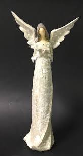 Sold at Auction: Decorative Angel Figure