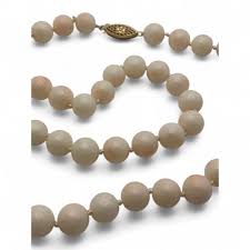 Sold at Auction: 14k Gold And Coral Beaded Necklace