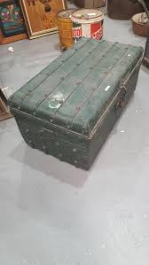 Sold at Auction: Steel travel trunk, green painted finish ...