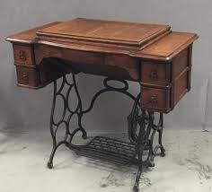 Sold at Auction: Vintage Paveway sewing machine w/oak table & wrought iron legs
