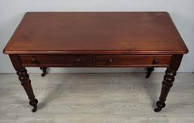 Sold at Auction: An Antique Cedar & Blackwood Two-Drawer Desk