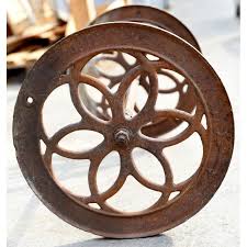 ancient pair of cast iron wheels