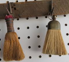 Sold at Auction: An artistic display of 13 vintage hand made whisk