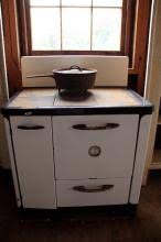 Sold at Auction: 315. "Round Oak" Wood Cook Stove